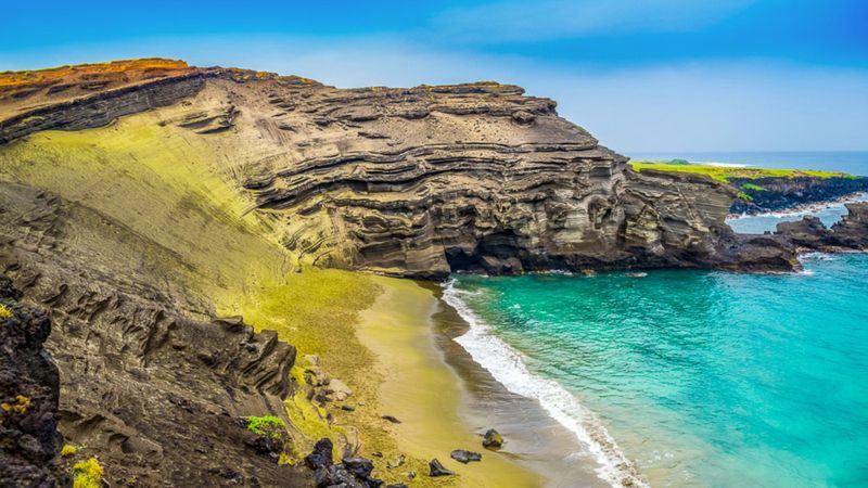 Visit the Green Sand Beach at Papakōlea