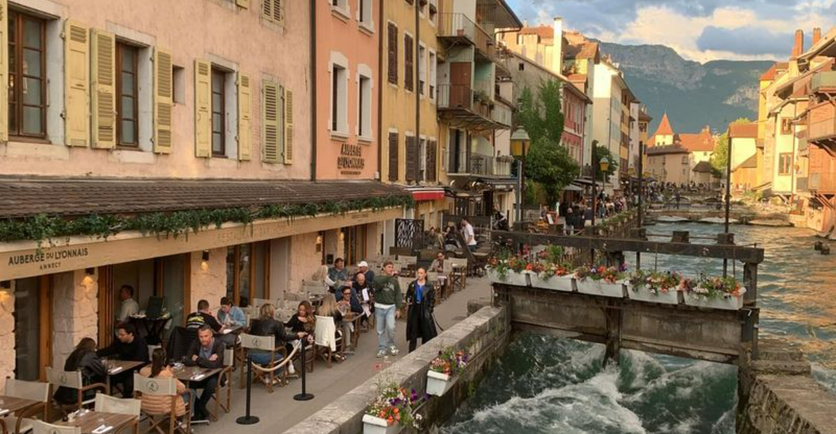 The French Town Known as the ‘Venice of the Alps’ Has Canals, a Turquoise Lake, and Michelin-Starred Dining