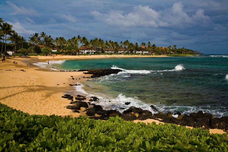 Swimming and Sunbathing at Poʻipū Beach