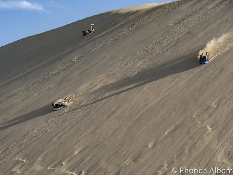 Sandboarding at Te Paki