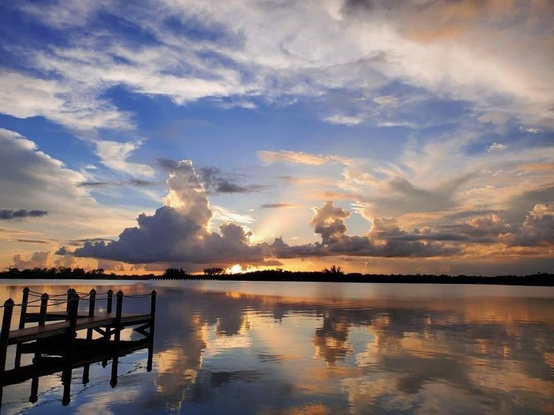 Watch the Sunset From a Dock With Your Toes in the Water