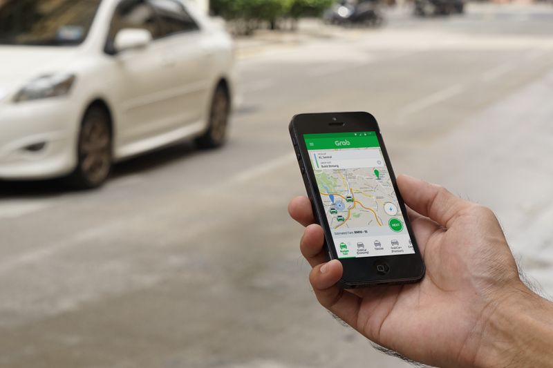 Use Grab or local ride apps