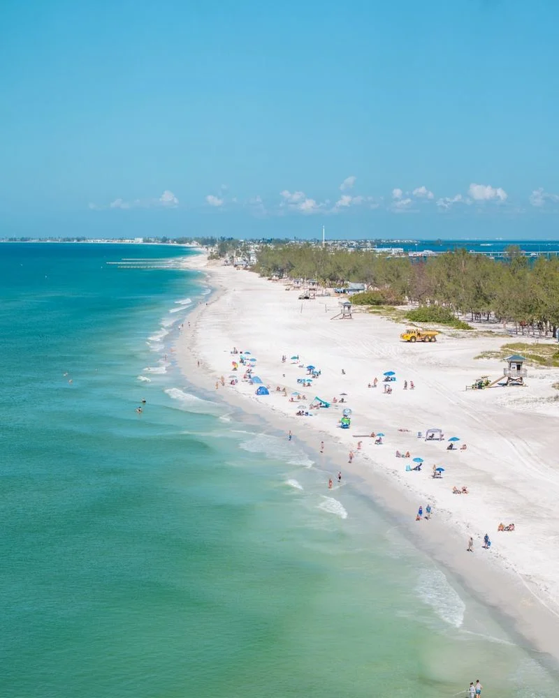 Visit Coquina Beach for Shade and Soft Sand