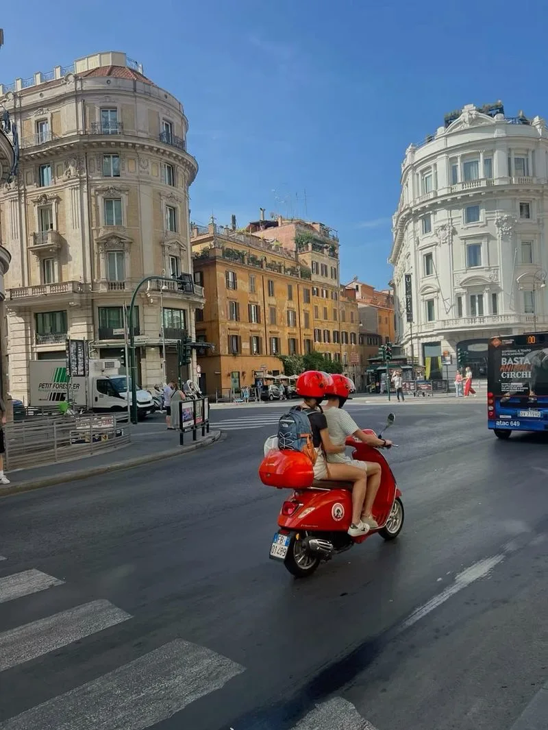 Ride a Vespa or just watch the traffic swirl