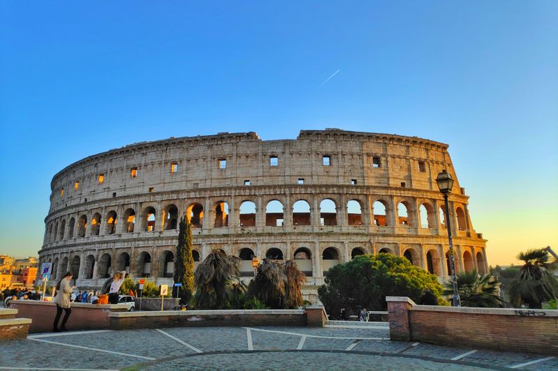 Stand in the shadow of the Colosseum
