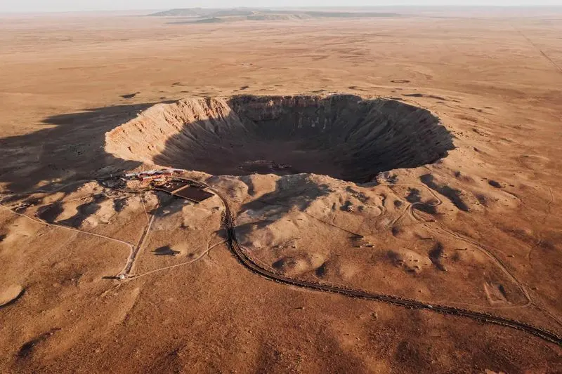 Stand at Meteor Crater (Winslow)