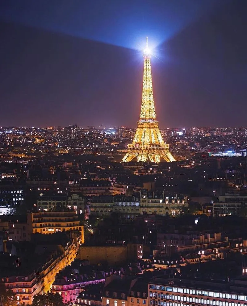 Watch the Eiffel Tower Sparkle at Night
