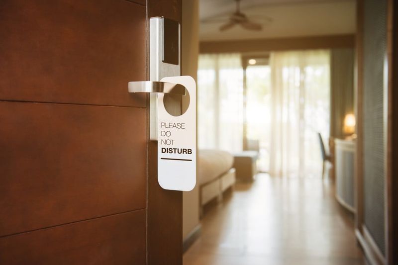Ignoring Do Not Disturb Signs or Boundaries