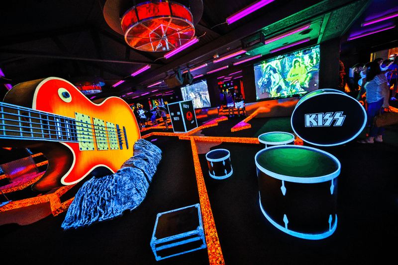 Indoor glow-in-the-dark mini golf at KISS by Monster Mini Golf