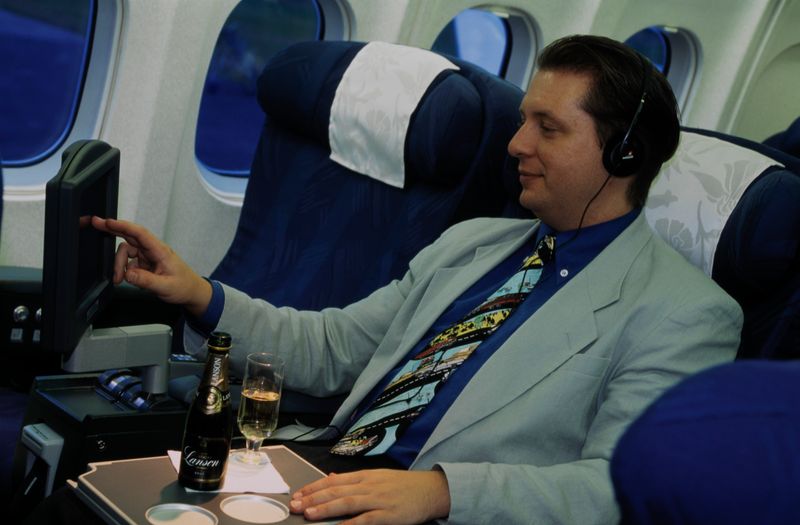 Leaving headphones on during drink service