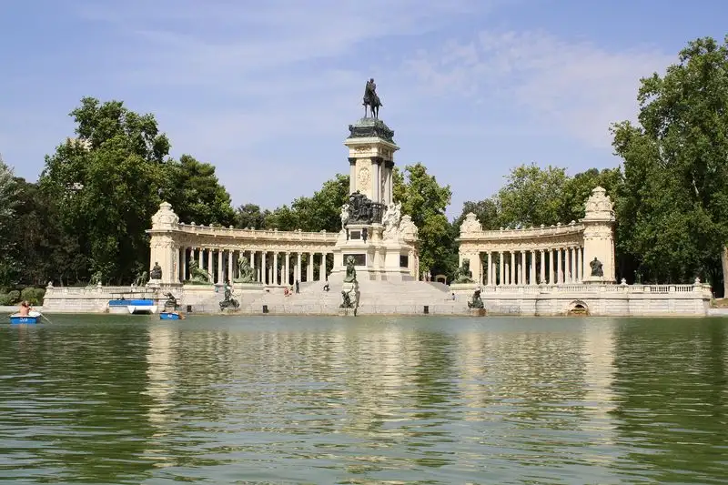 Explore parks like Retiro Park for a break from the city