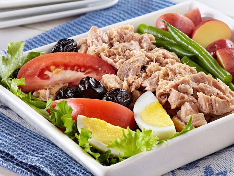 Enjoy a Niçoise salad in a café tucked into a side street