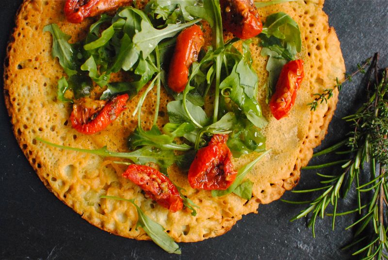 Sample socca (a local chickpea pancake) hot from the oven