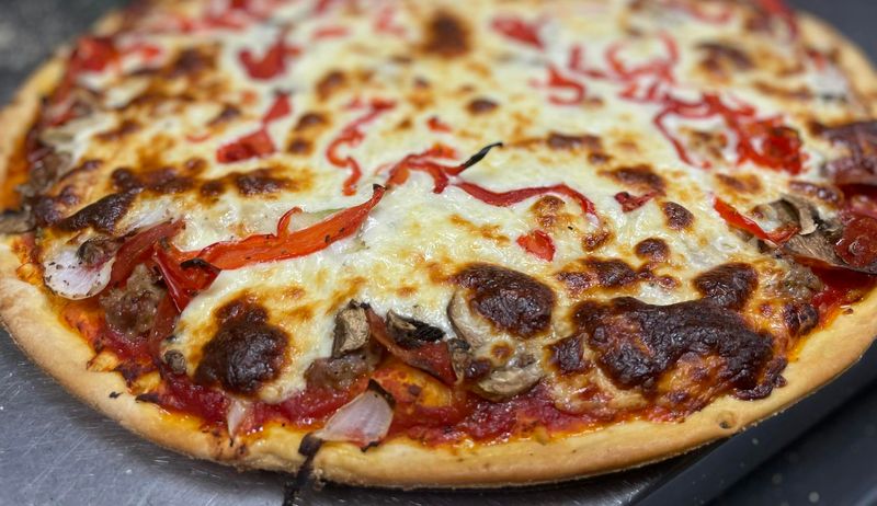 Wig & Pen Pizza Pub – Iowa City