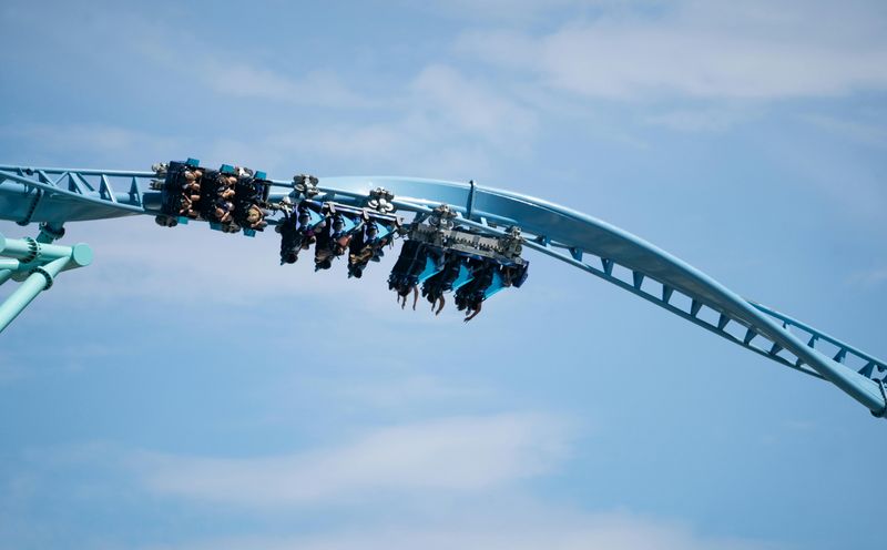 Riding roller coasters at an amusement park