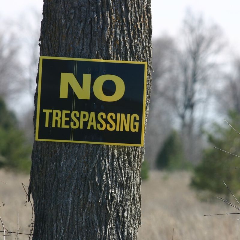 Walking onto private land or opening posted gates