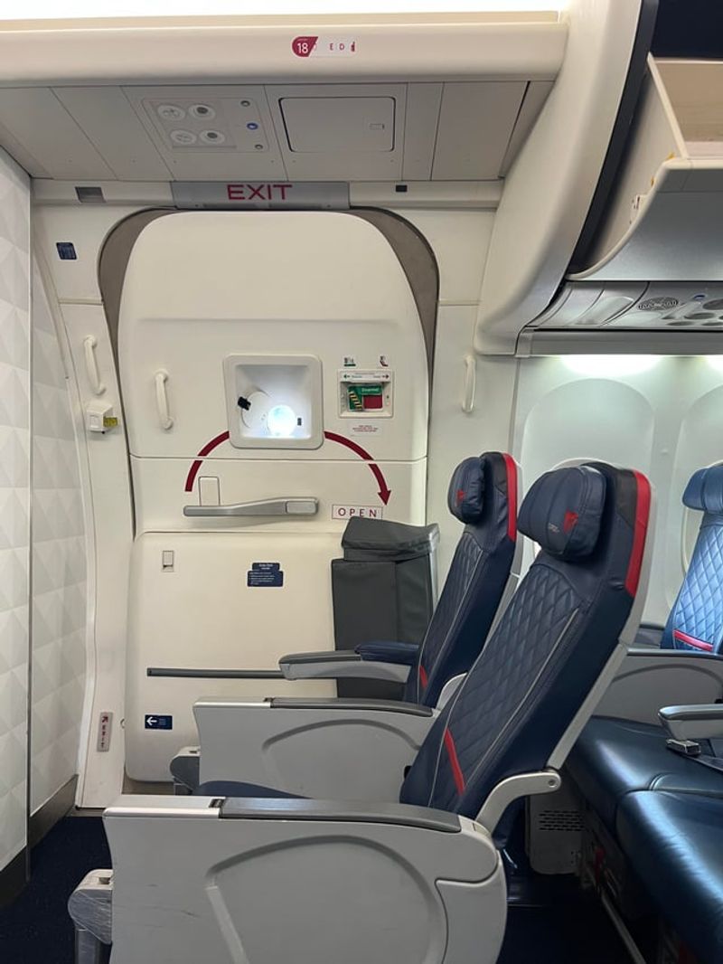 Exit-row seats with limited recline