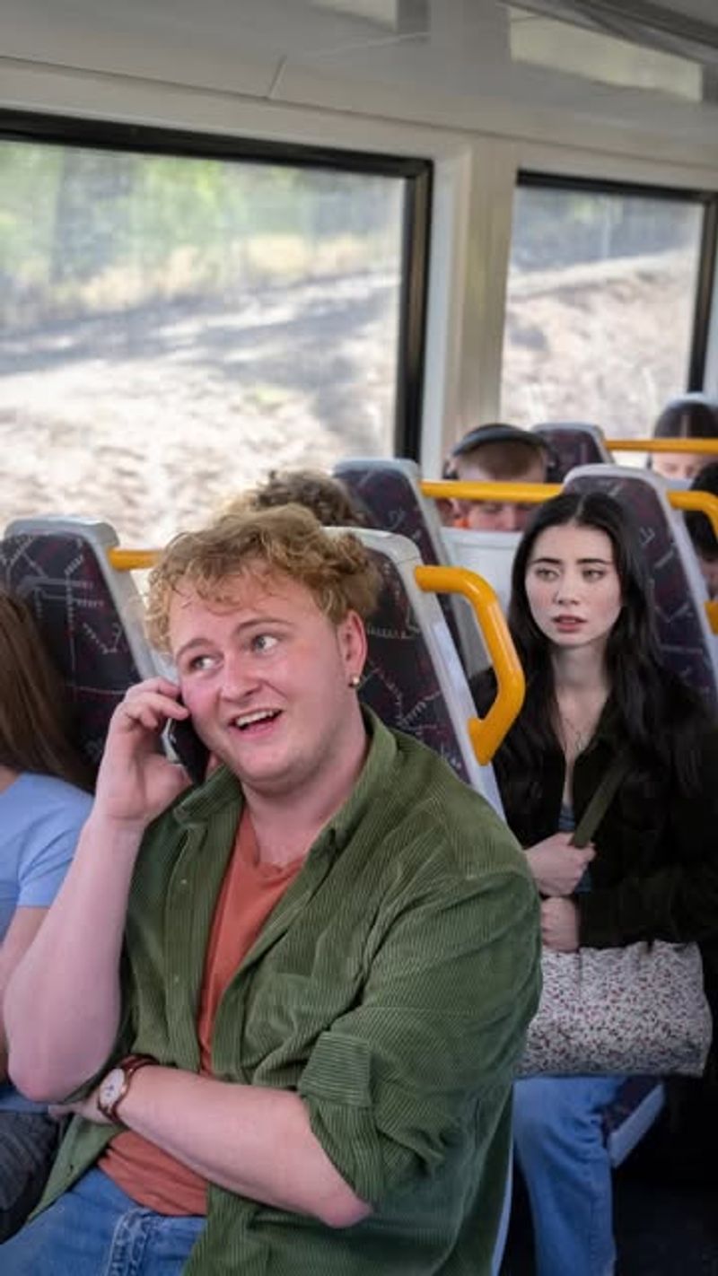 Using your phone loudly in shared public spaces