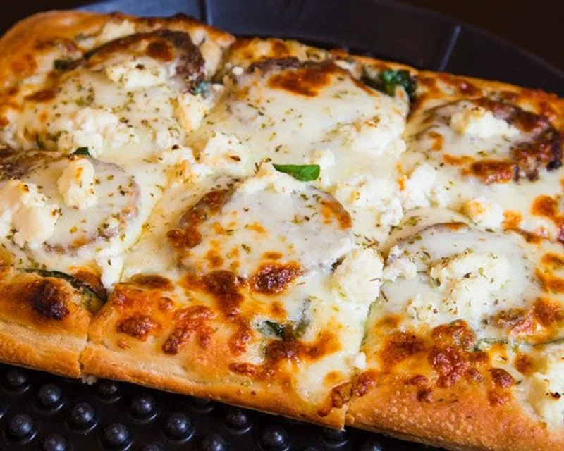 Naked City Pizza Company