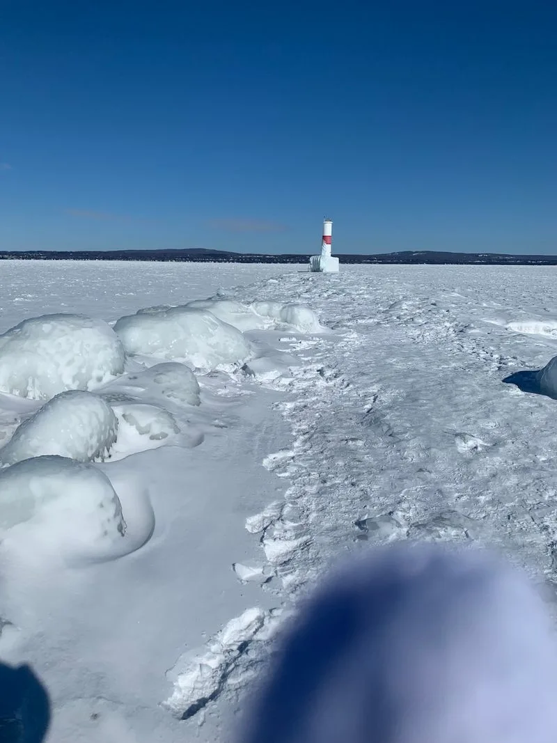 Harbor Sunset and Lighthouse Glow
