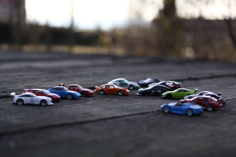 Miniature car models (BMW or Porsche)
