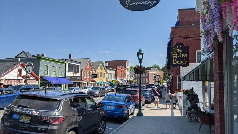 Main Street window displays, shopfront trees, and slow browsing