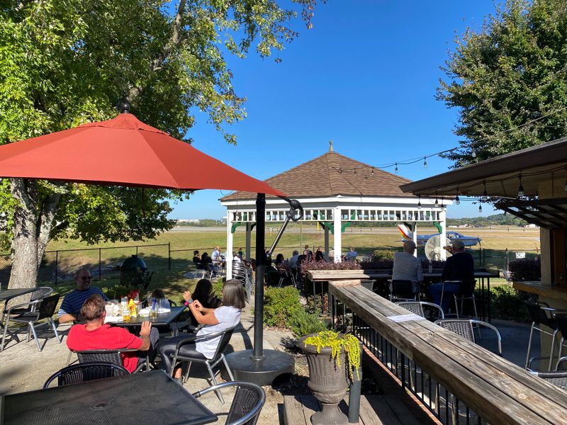 Runway views and patio seating strategy