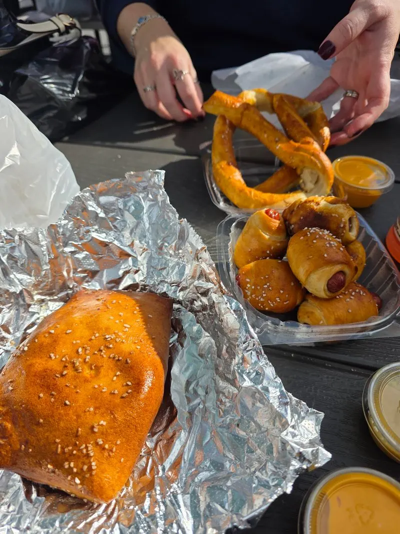 Iconic bites: sausage sandwiches, chicken on a stick, and fries