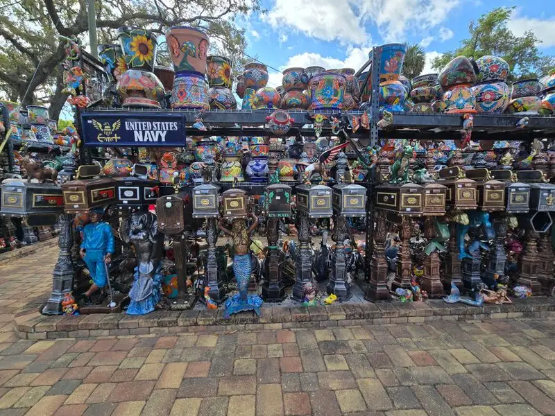 Sun faces, wall art, and colorful ceramics