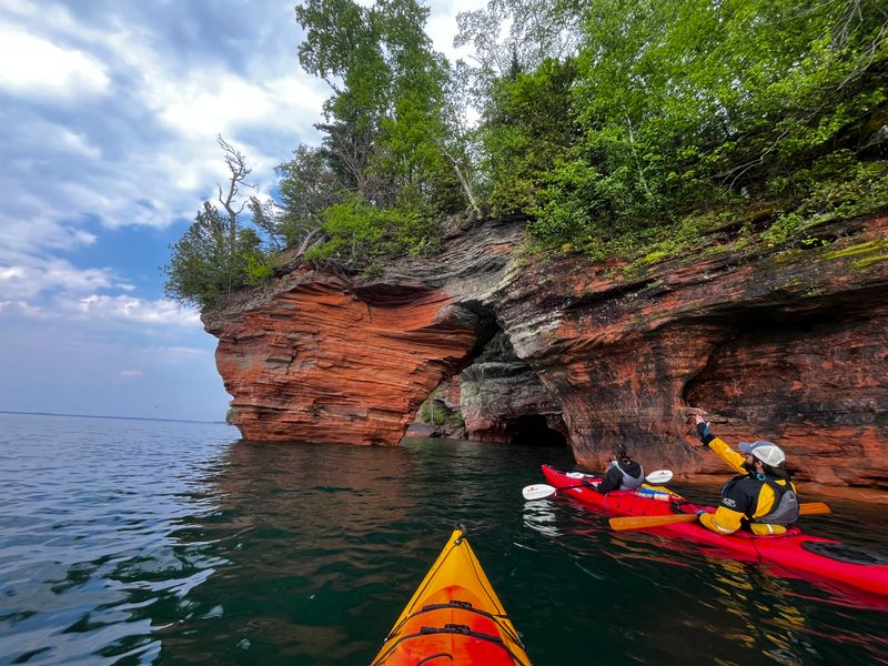 Kayaking Along Limestone Cliffs