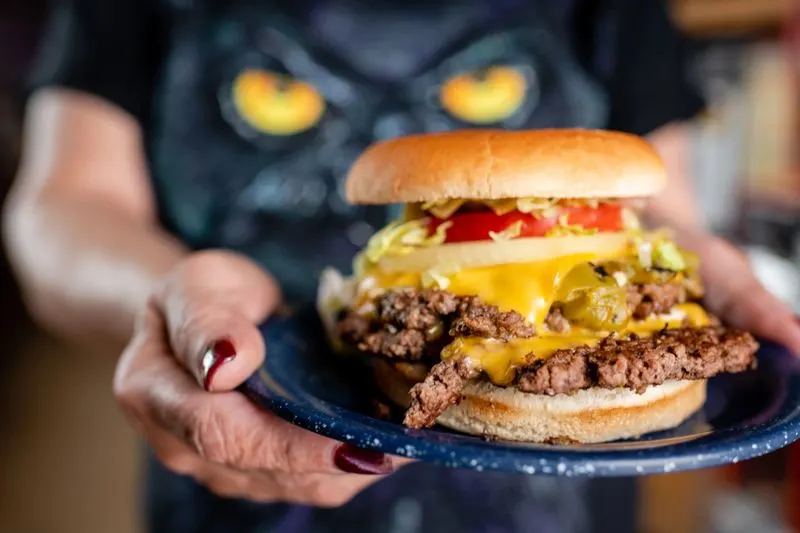 Taste notes: bun, patty, chile, and cheese