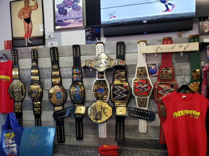 Memorabilia Highlights: Belts, Figures, and Signed Treasures