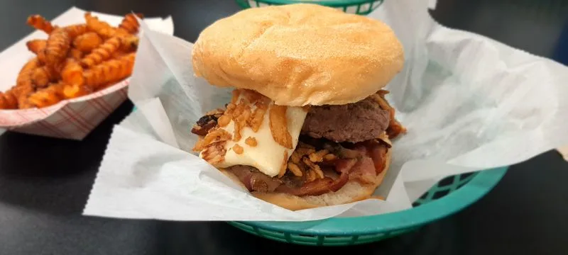 What makes the flavor unique compared to grilled burgers