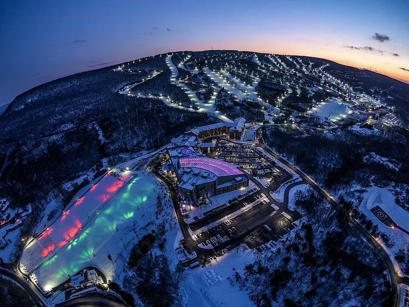 Galactic snow tubing at night
