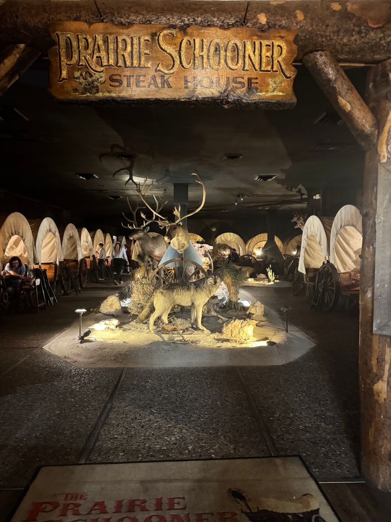 Covered Wagon Booths With Campfire Glow