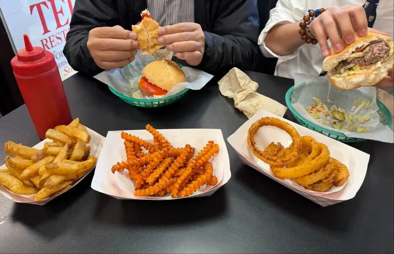 Sides That Complete the Experience: Fries, Home Fries, and Onion Rings
