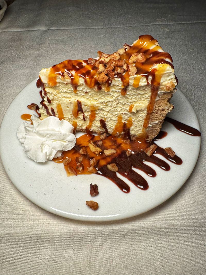 Scratch made dessert cart with seasonal pies and layered cakes