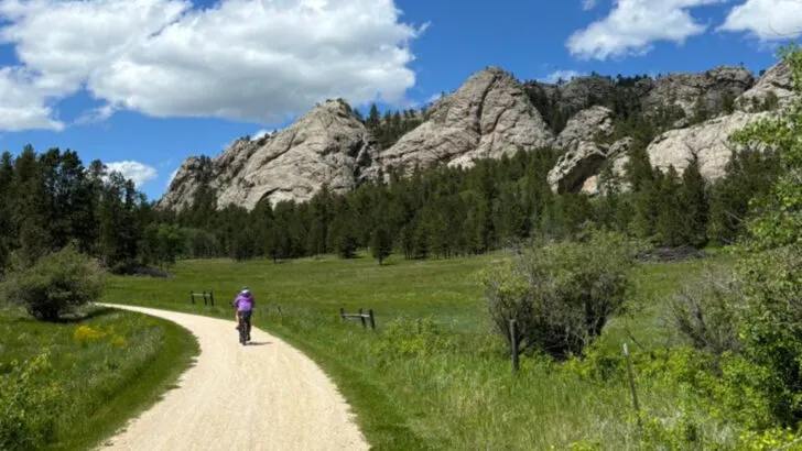 A 109-mile bike trail in South Dakota crosses 100 old railroad bridges and four hand-carved tunnels