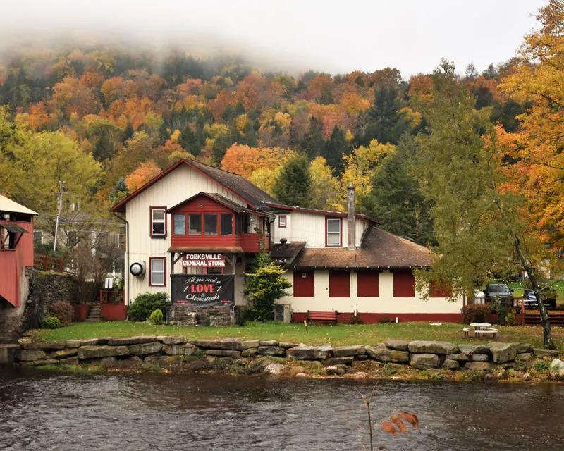 Where It Sits: Covered Bridge, Creek, and Mountain Views
