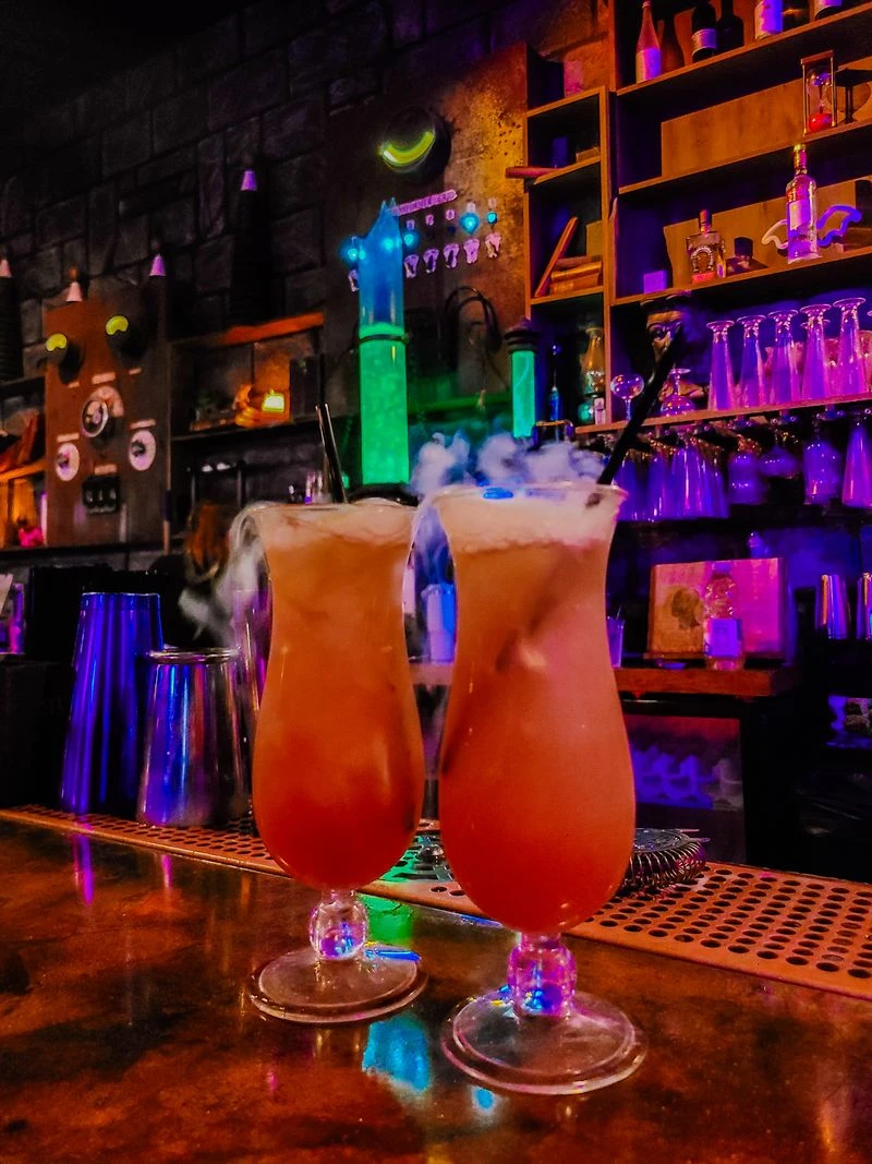 Signature cocktails that smoke and shimmer