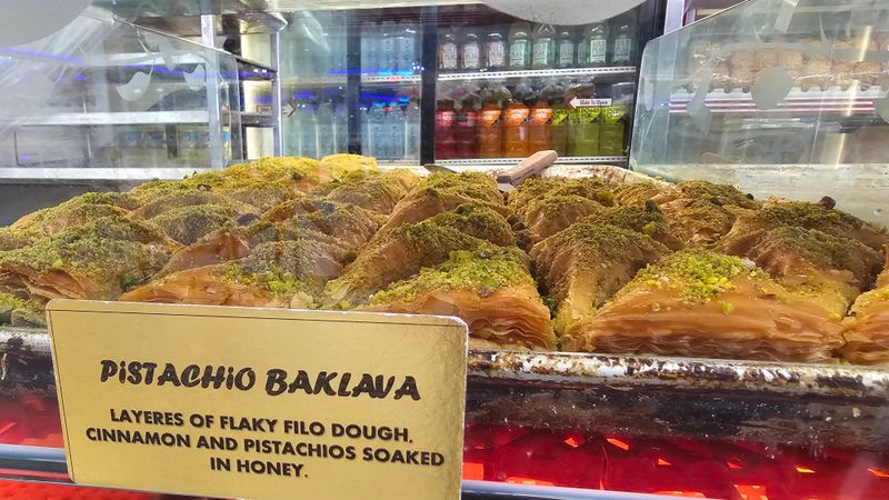 Baklava and the pastry case glow