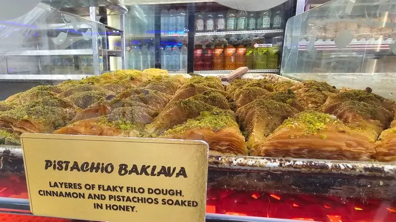 Baklava and the pastry case glow