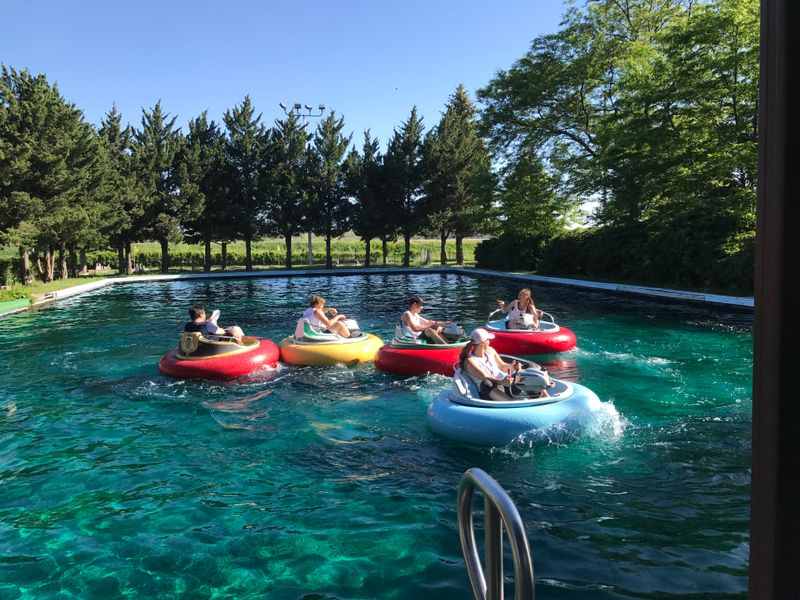 Bumper boats, water slides, and summer-cool vibes