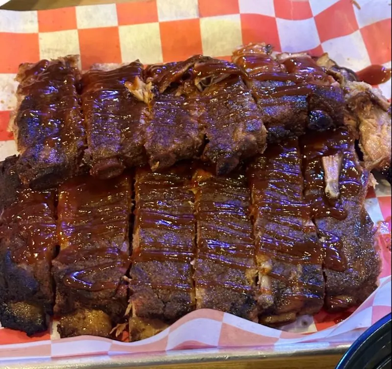 Ribs: Smoke-Kissed Bones That Barely Hold On