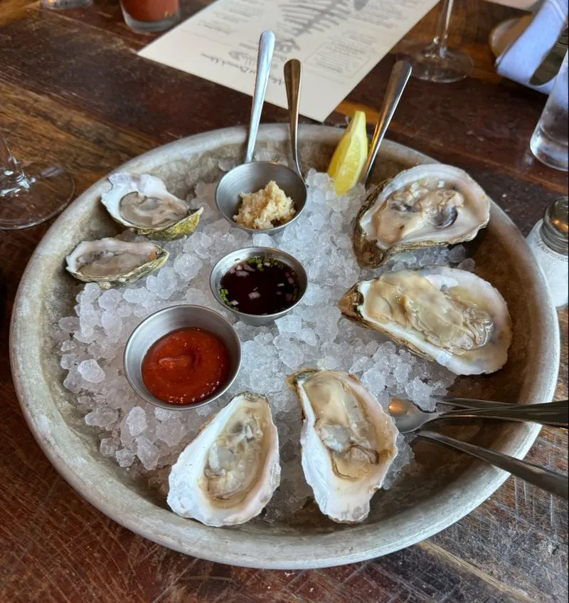 The Oyster Ritual: Raw Bar Highlights and Happy Hour