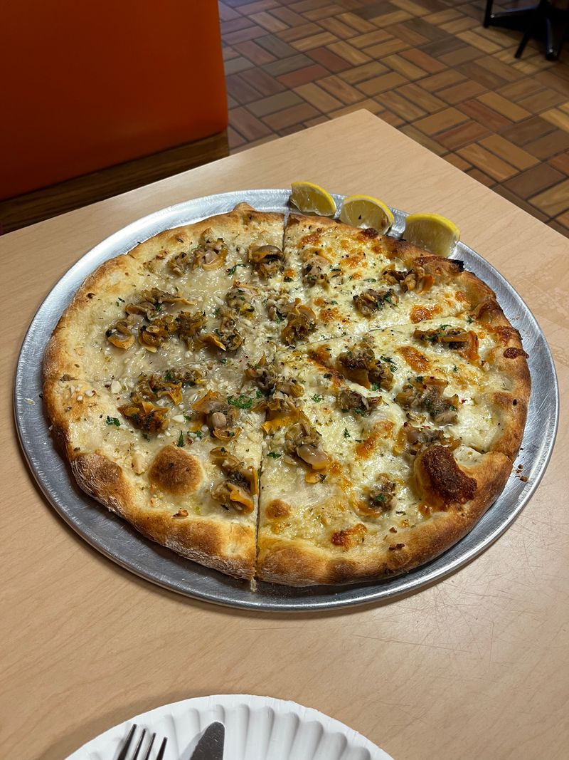 What apizza means here: thin, charred crust and simple toppings