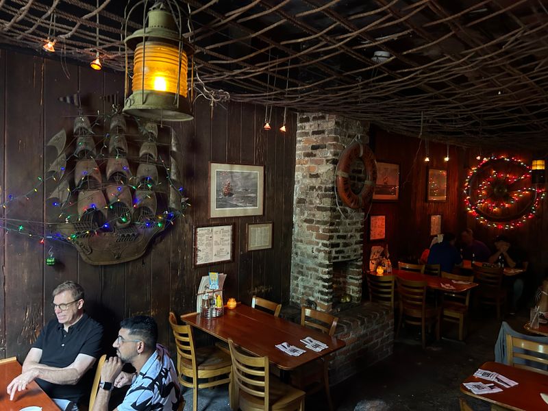 Ambiance: Dive Bar Spirit With Nautical Touches