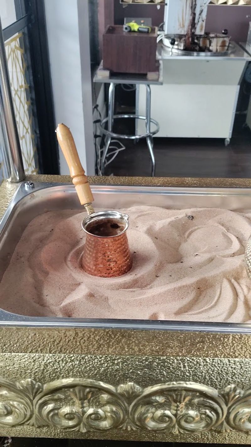 Traditional Turkish Coffee Brewed in Hot Sand