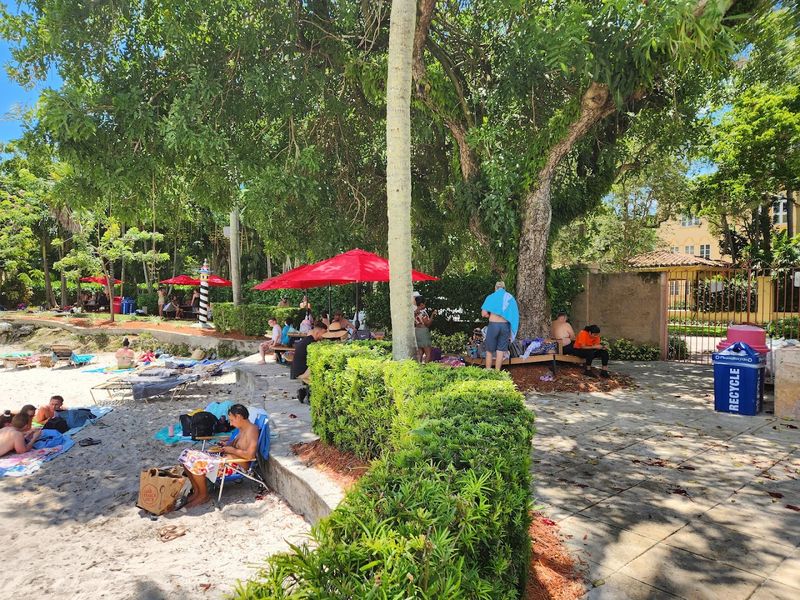 A Sandy Beach Area Right Next to the Pool