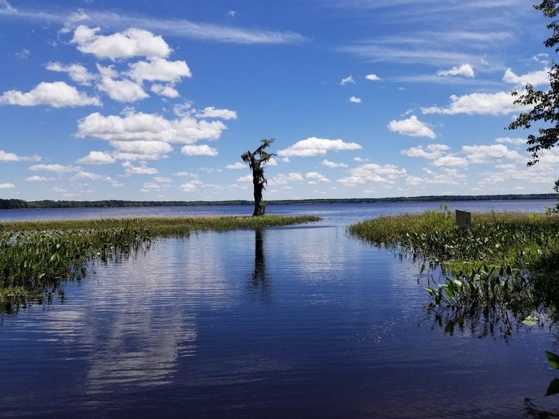 Fishing And Small Boats On Ocean Pond